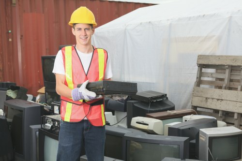 Professional garage clearance team at work