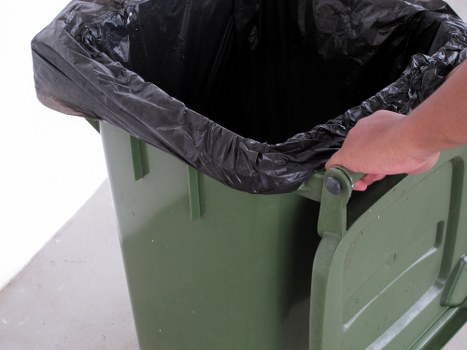 Waste clearance vehicle operating in Shepherds Bush